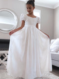 Full-length skirt on Valentina white flower girl dress