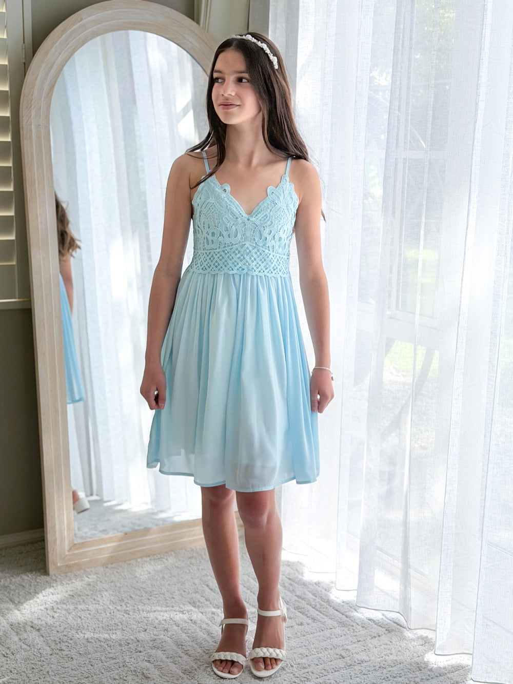 Vivienne light blue girls dress with lace bodice, front view.