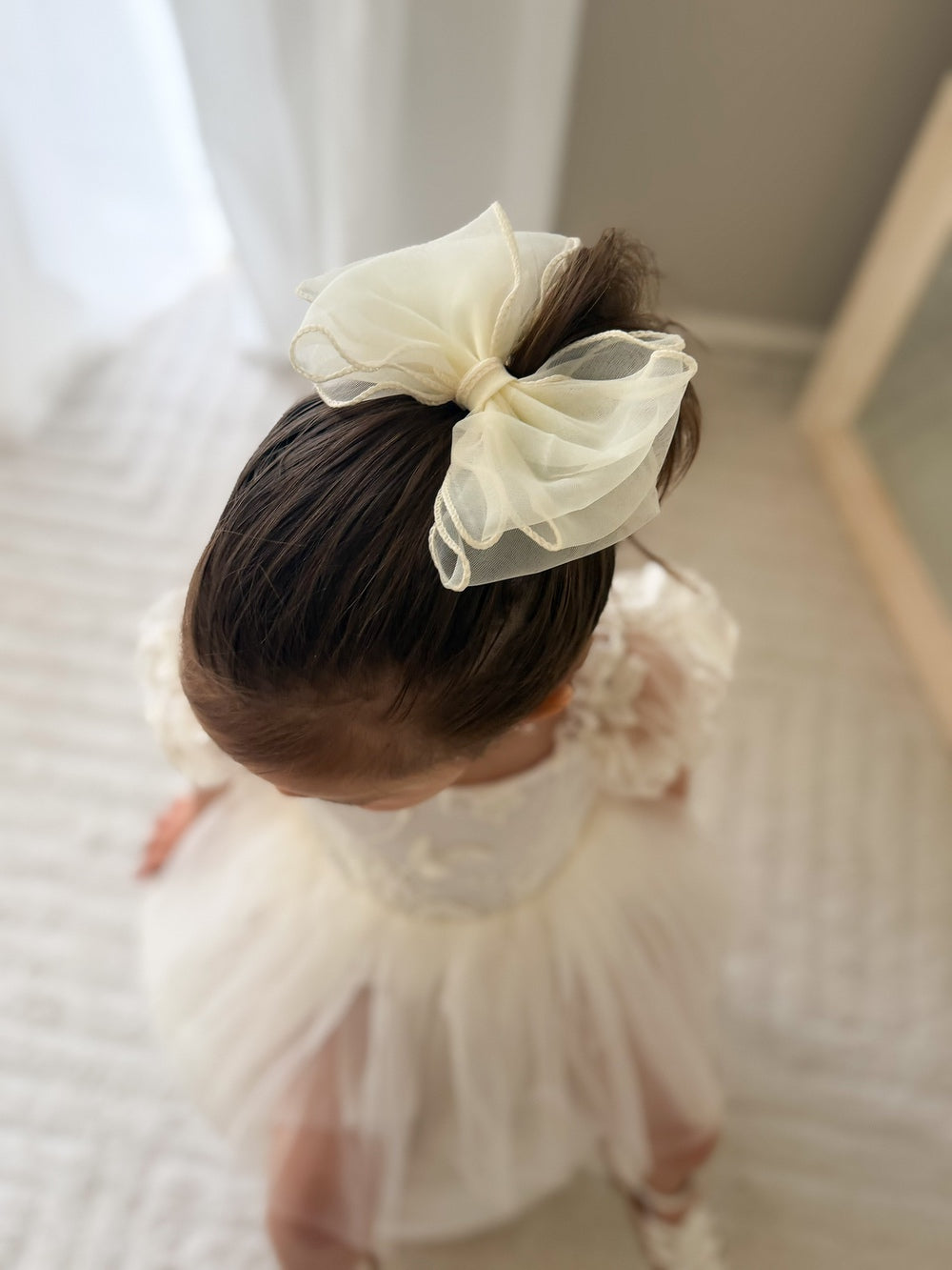 Wavy Girls Bow - Ivory - Girls Ivory DressesClassic ivory hair bow without tails styled in a bun or curls