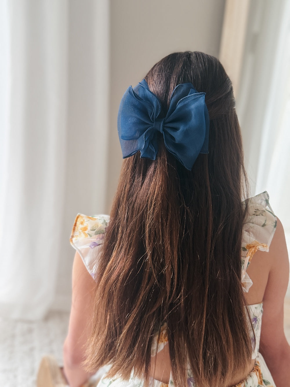 Girls navy wavy hair bow on clip – elegant accessory for flower girls and parties