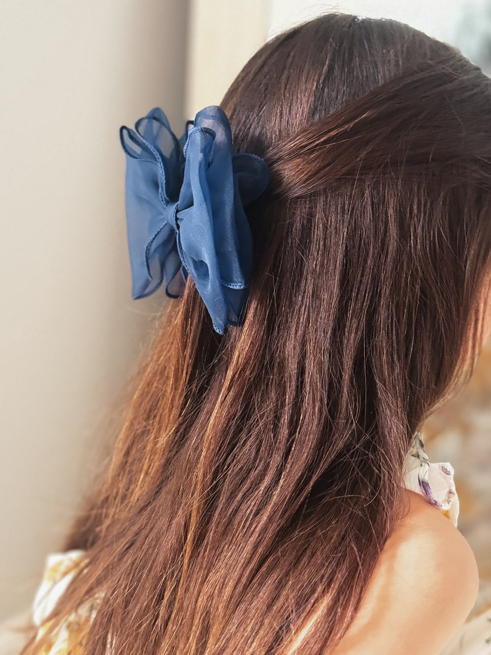 Navy blue girls bow with wavy design – perfect hair accessory for weddings and special occasions