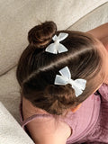 Girls white petite bow clips set of two