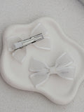 Girls white pigtail bow clips