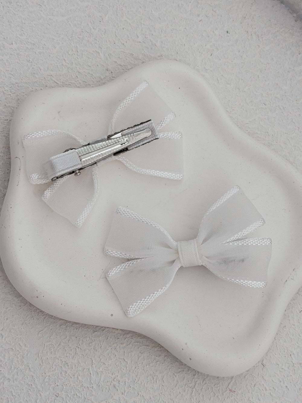 Girls white pigtail bow clips
