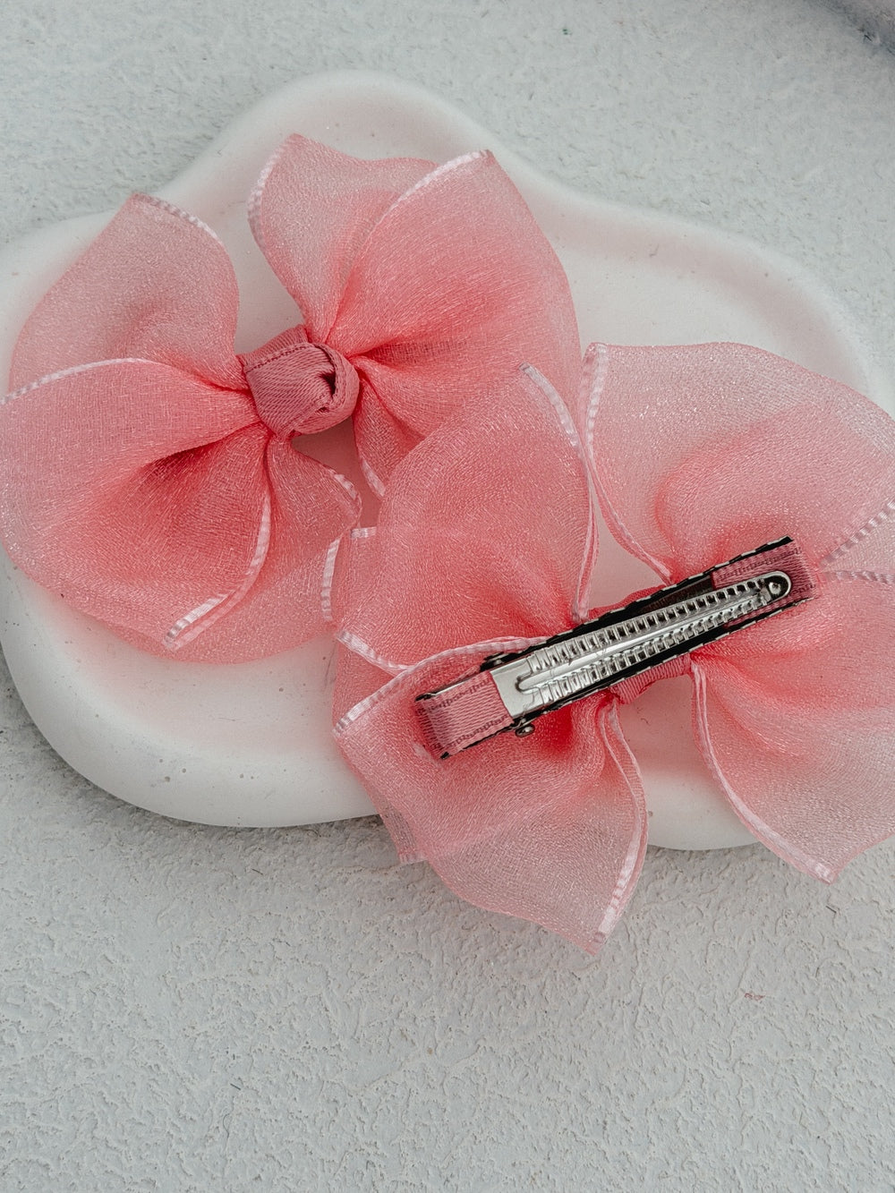Blush peach pigtail bow clips for birthdays and weddings