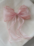 Light pink organza curly girls hair bow with flowing tails