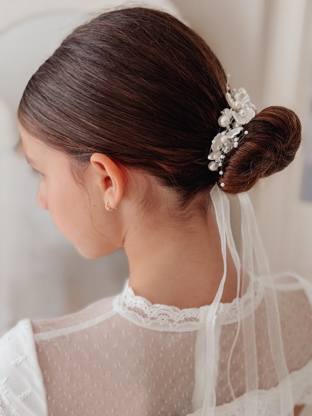 Delicate ivory flower hair accessory for girls
