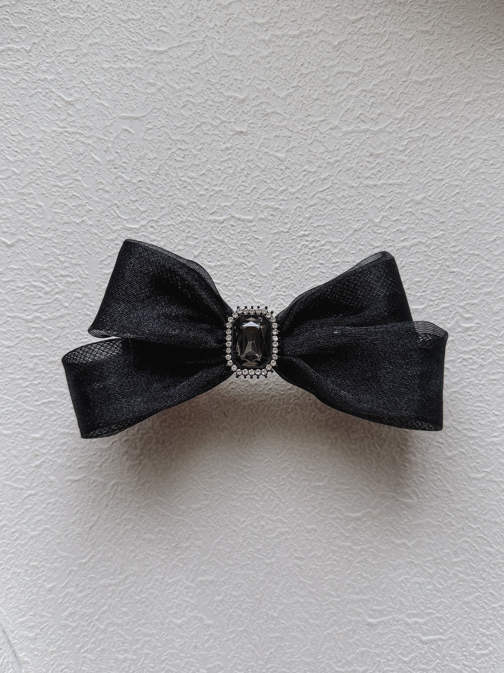 Girls bow hair clip with diamante centre