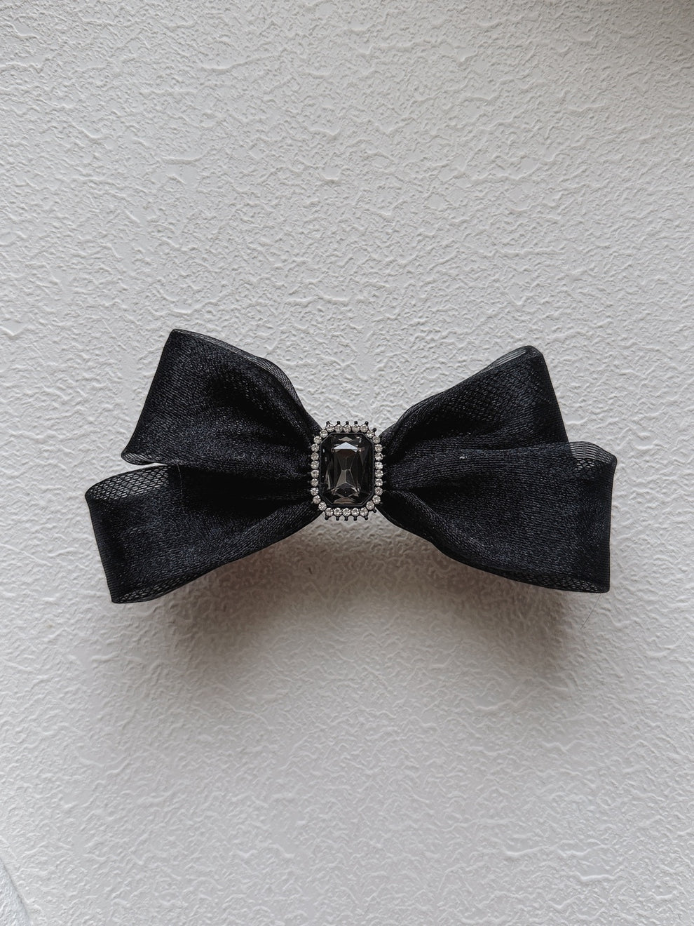 Girls bow hair clip with diamante centre