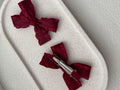 Matching red Christmas bows for twin ponytails or braids
