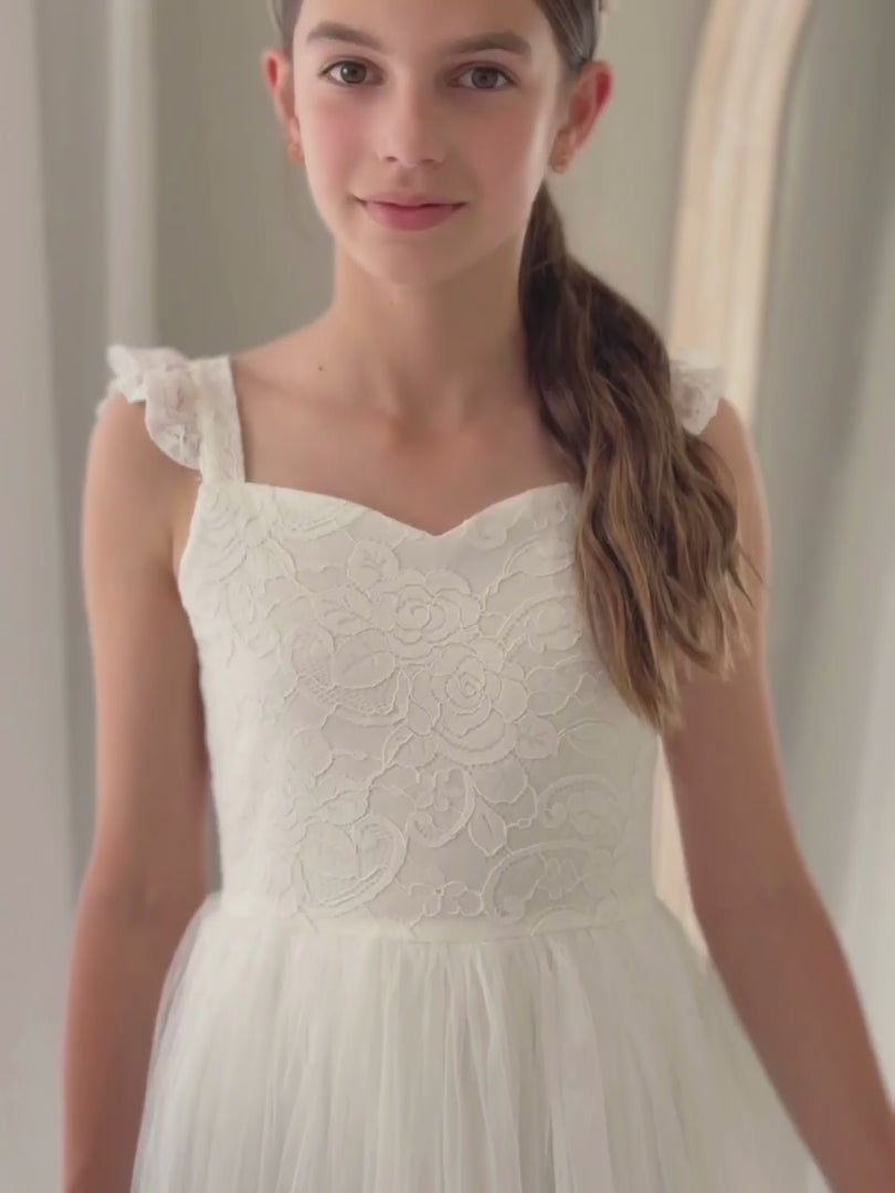 Girls white tulle skirt dress twirling shot