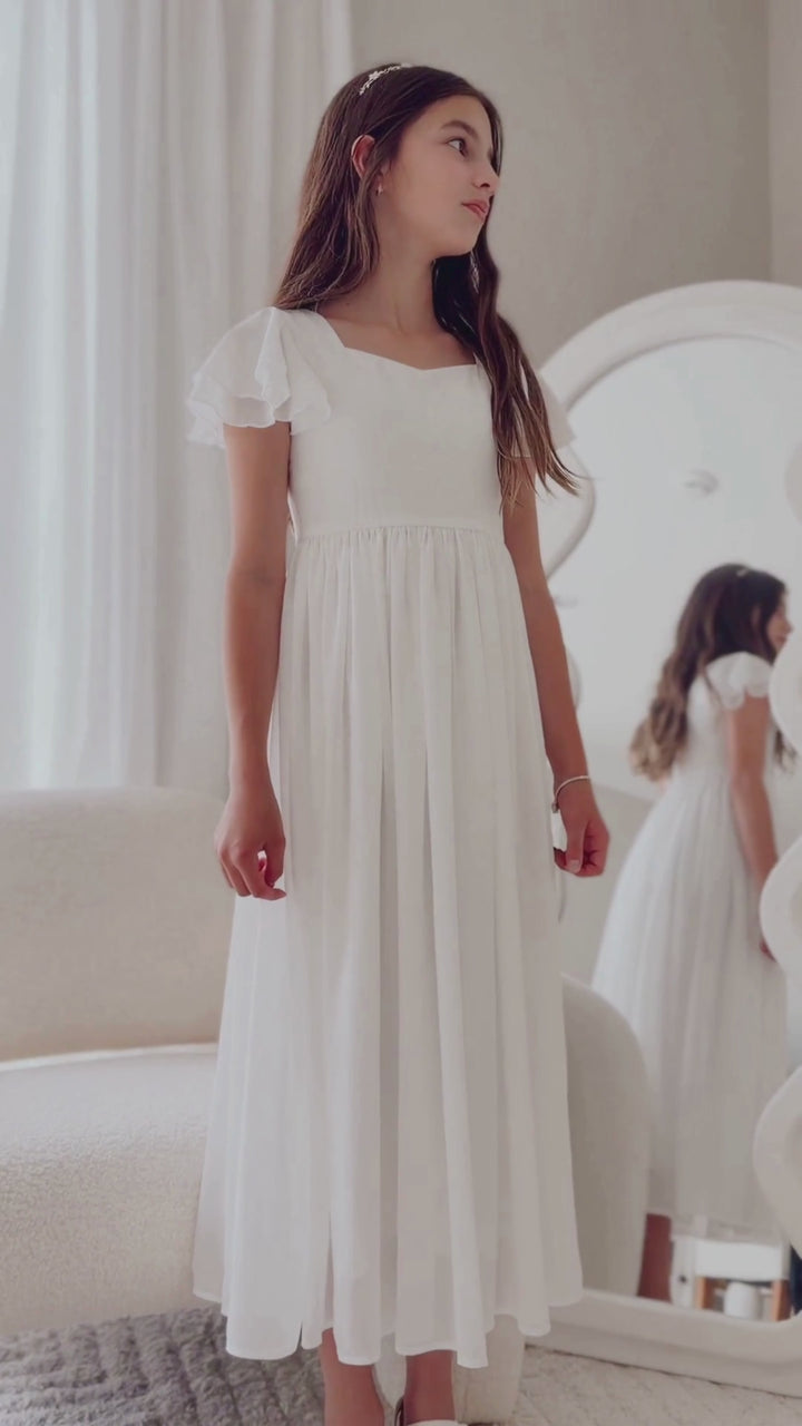 girls white occasion dress with soft flowing skirt
