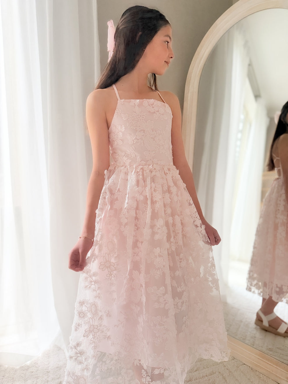 Video close-up girl twirling in 3D floral detailing on Clarissa Girls Light Pink Dress bodice and skirt