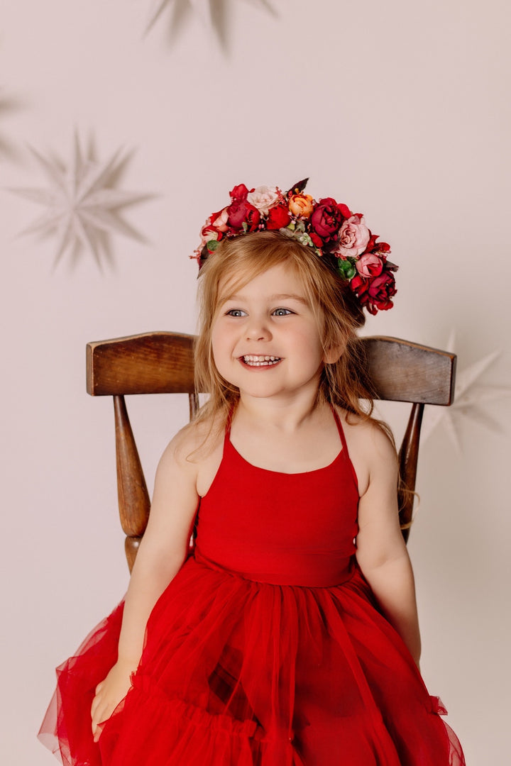 Close-up of the Winterberry Red Girls Flower Crown with burgundy, blush and peach floral details