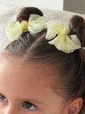 Girls yellow pigtail bows in soft tulle