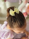 Soft yellow tulle bow clips for girls