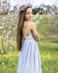 Girl wearing Sofia Dusty Blue Dress as a junior bridesmaid at a wedding