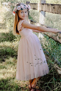 Tea-length dusty pink tulle skirt on flower girl dress