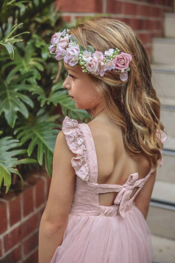 Little girl wearing dusty pink Ella Rose dress outdoor photo